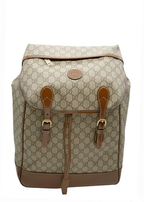 gucci gg supreme leather backpack|Gucci guccissima slim backpack.